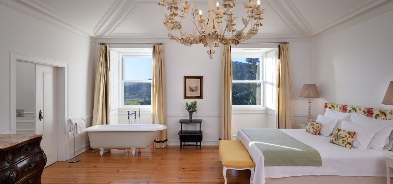 White bedroom with bathtub - Wine Paths